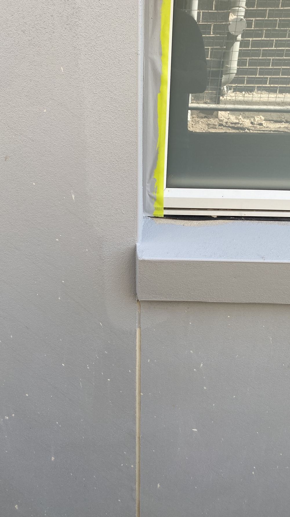 Expansion joint broken partway up the wall instead of running continuously, Gables