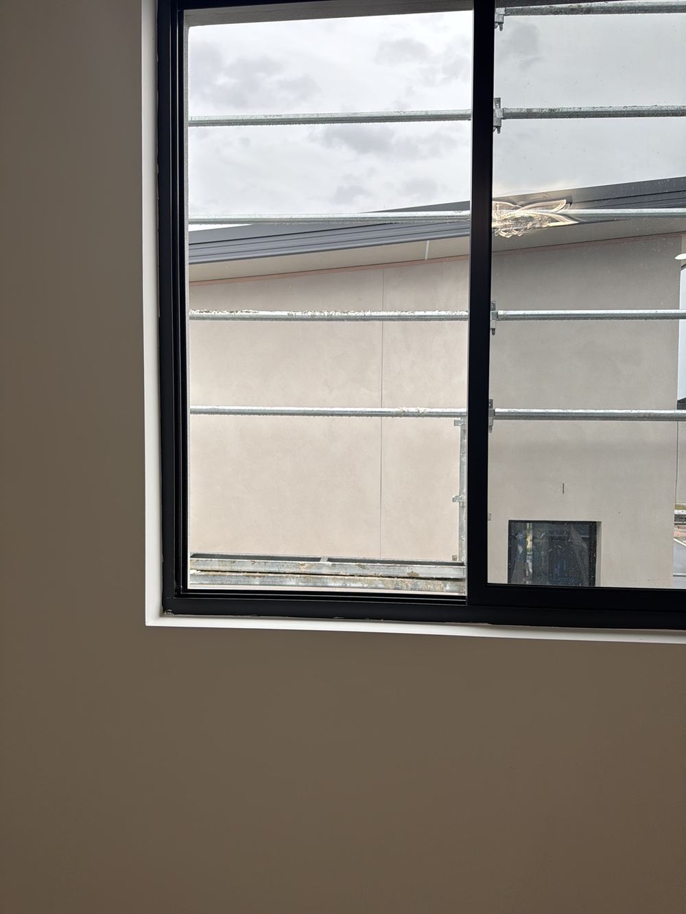 First floor bedroom window opening wider than the 125mm child safety limit, found during a handover inspection in Gables